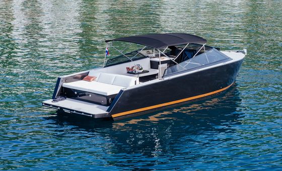 Sleek modern luxury motor yacht anchored on calm blue Adriatic waters