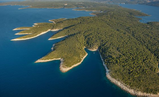 Aerial view of the Pakleni Islands near Hvar, Croatia, with forested islets, rocky shores and turquoise Adriatic Sea coves