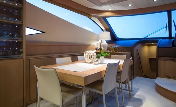 Modern dining area inside a luxury yacht cruising the Adriatic Sea